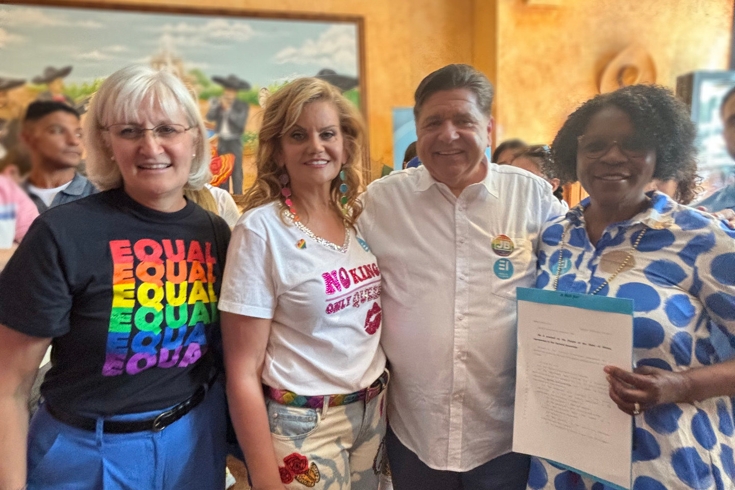State Senator Adriane Johnson, State Senator Mary Edly-Allen, Governor J.B. Pritzker at the signing of House Bill 4834