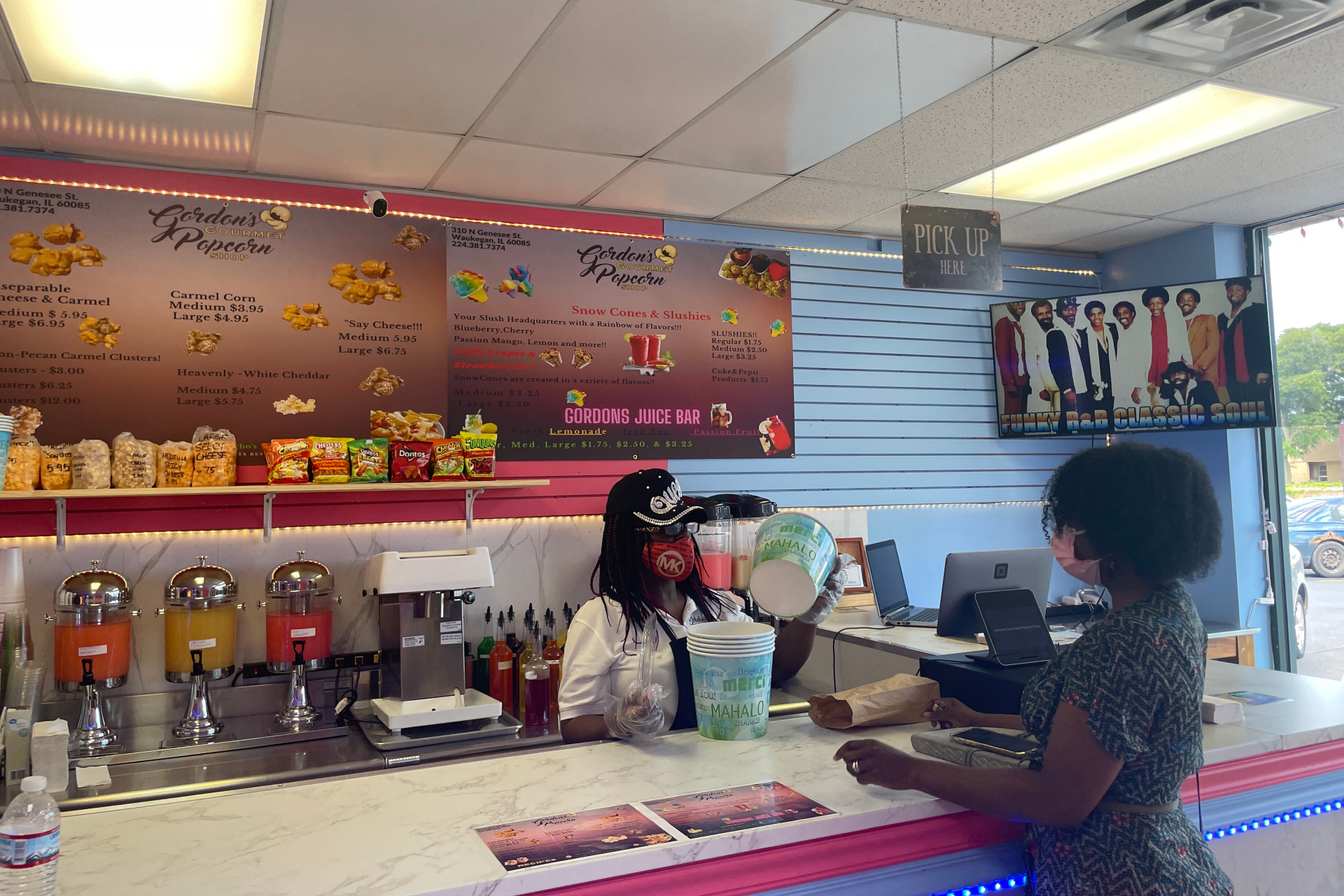 Johnson visits local popcorn shop for National Black Business Month urges more business owners to sign up for a tour 1